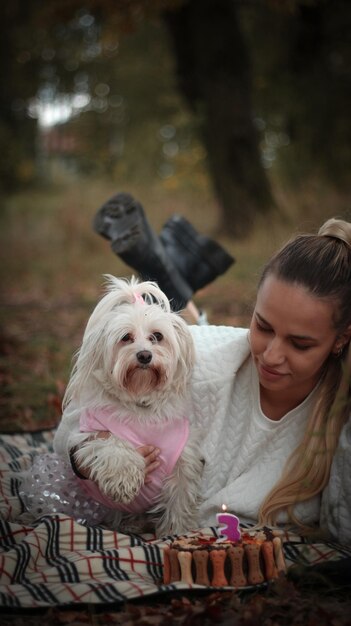 Photo portrait of woman with dog