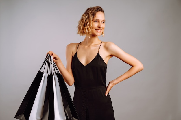 Portrait woman with shopping bags