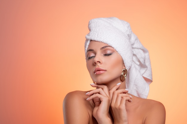 portrait woman with towel on head