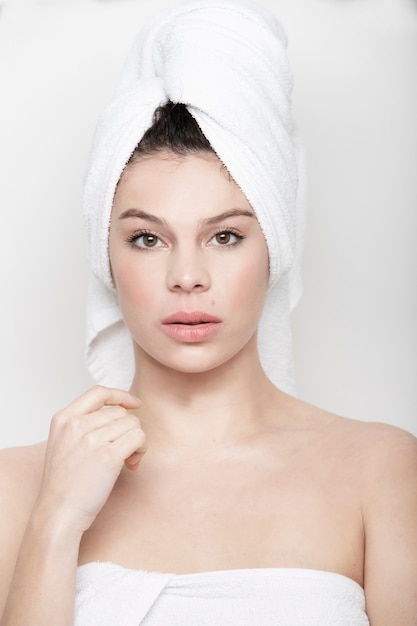 Portrait of woman with towel in her head