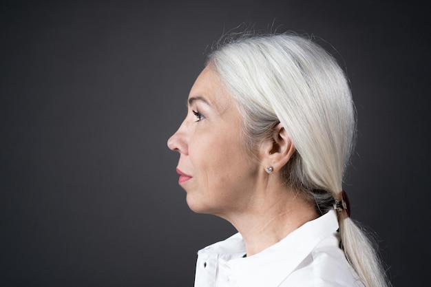 Portrait of woman with white hair