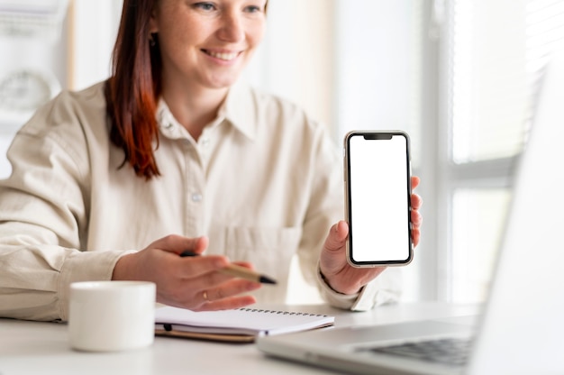 Photo portrait woman at work having video call