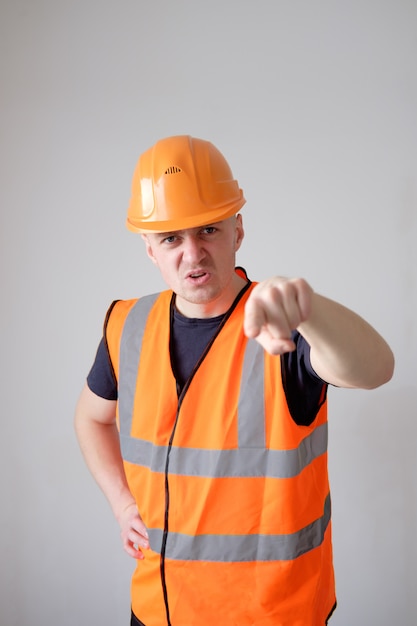 Portrait of a worker wearing a helmet