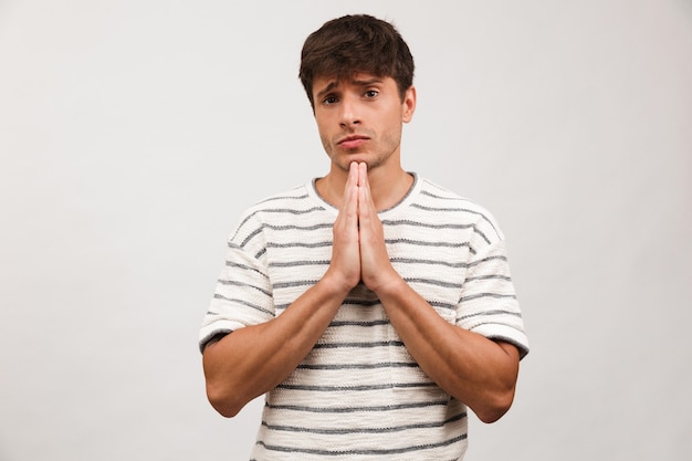 Portrait of a worried young man standing