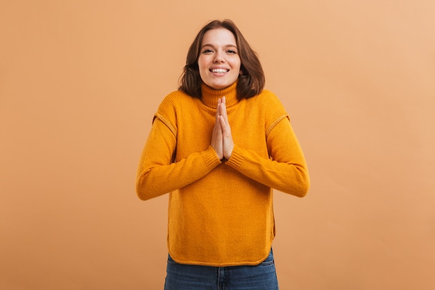 Portrait of a worried young woman in sweater