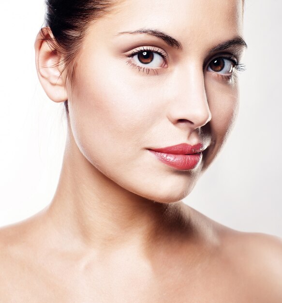 Portrait of young adult woman with health skin of face