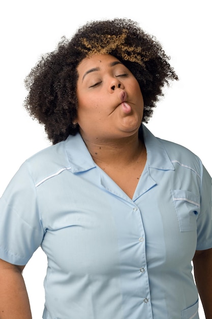 Photo portrait of young afro latina medical woman making funny face with fish mouth and closed eyes