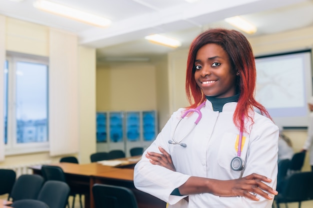 Portrait Of young afrocan-american Female Doctor In Doctor's Office