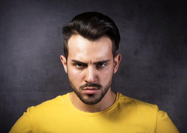 Portrait of young angry man