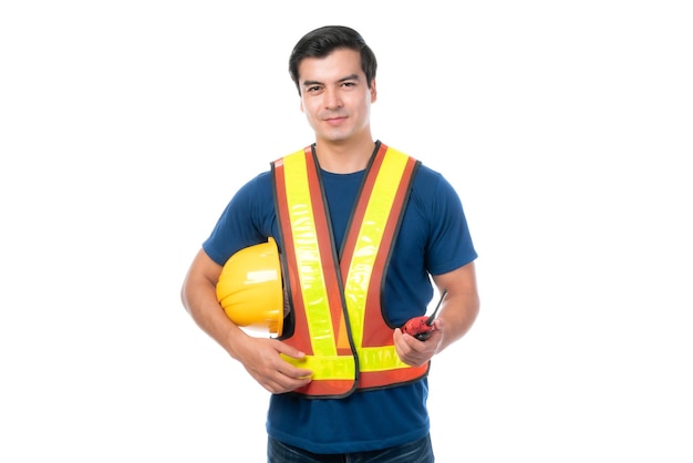 Portrait young architect man engineering holding yellow helmet and megaphone in hand He standing arms crossed isolated on white background with copy space