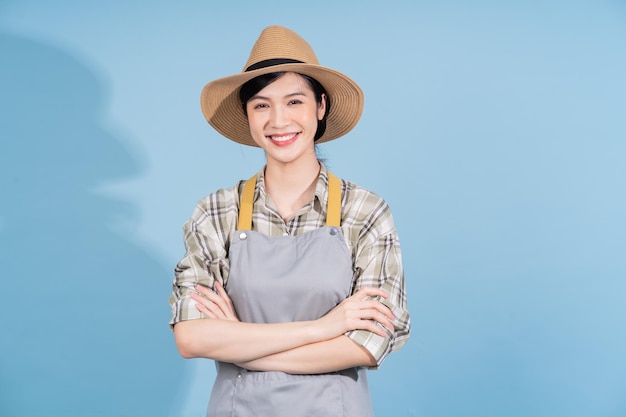 Portrait of young Asian female farmer