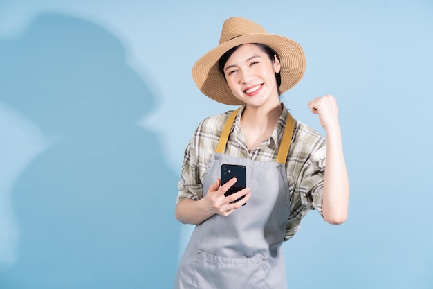 Portrait of young Asian female farmer