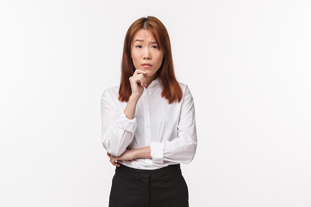 Portrait of a young asian female in office