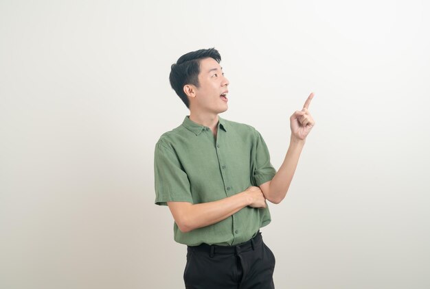 portrait young Asian man thinking on white background