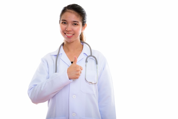 Portrait of young Asian woman doctor on white