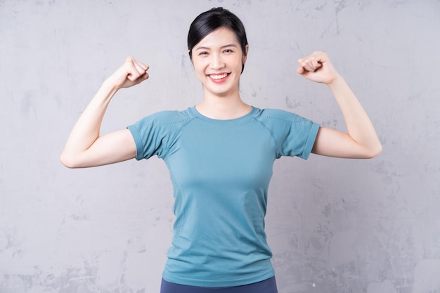 Portrait of young Asian woman wearing gym outfit