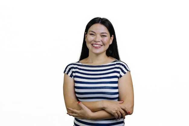 Portrait of a young asian woman with folded arms isolated on white