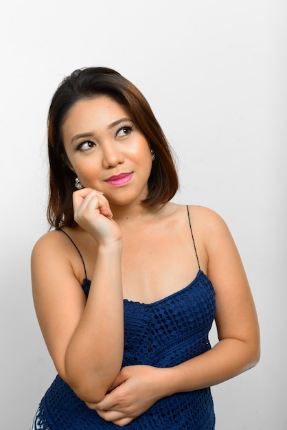 Portrait of young Asian woman with short hair