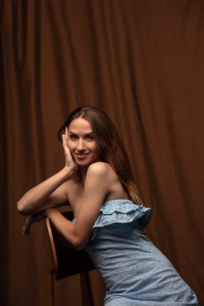 portrait of a young attractive woman on a dark background