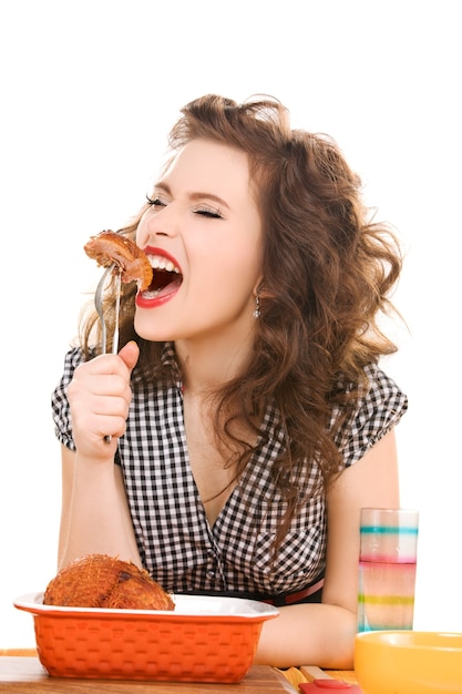 portrait of young attractive woman in the kitchen