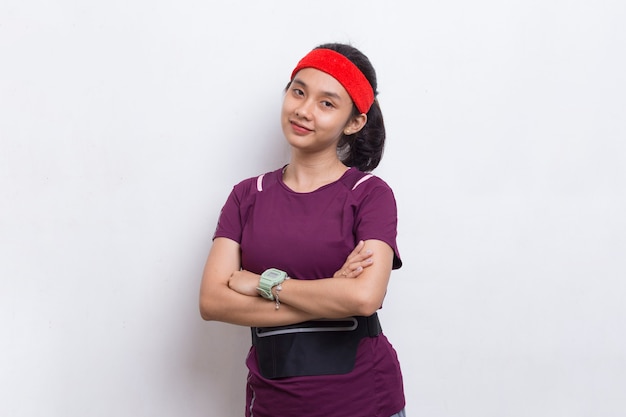 Portrait of young beautiful asian sport woman on white background