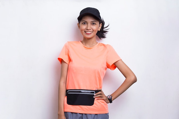 Portrait of young beautiful asian sport woman on white background