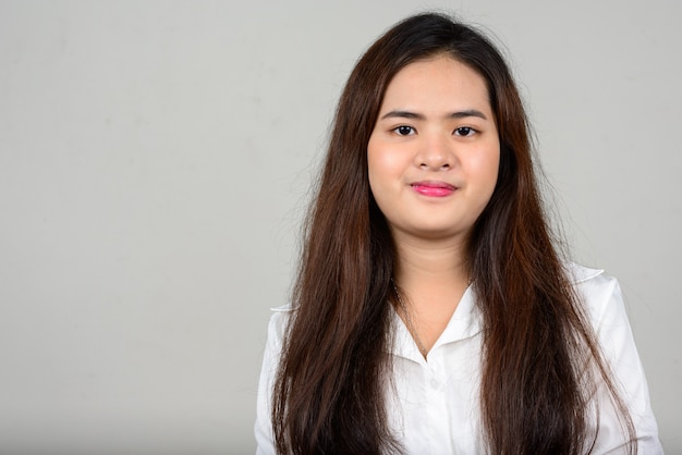 Portrait of young beautiful Asian teenage girl