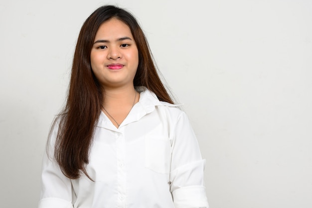 Portrait of young beautiful Asian teenage girl