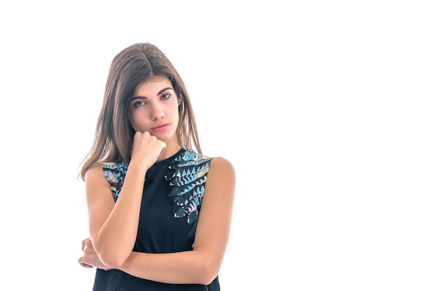 Portrait of Young Beautiful Brunette Girl looking at camera over white background