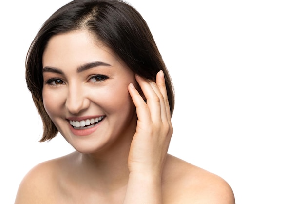 Portrait of young beautiful brunette woman on white background