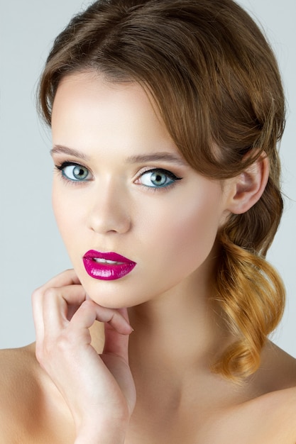 Portrait of young beautiful brunette woman