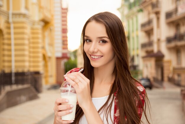 Portrait of young beautiful brunette woman