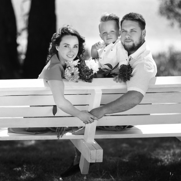 Portrait of a young beautiful family with pregnant mother