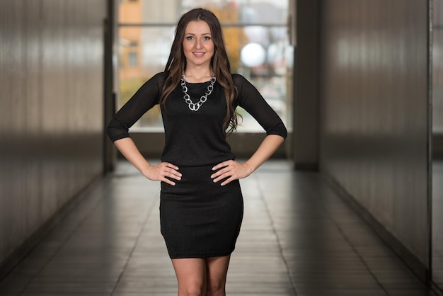 Portrait Of Young And Beautiful Fashion Model In The Shopping Mall  Professional Makeup And Hair Style