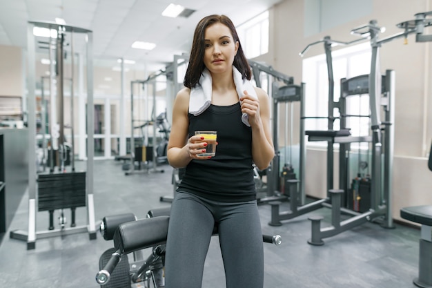 Portrait of young beautiful fitness woman