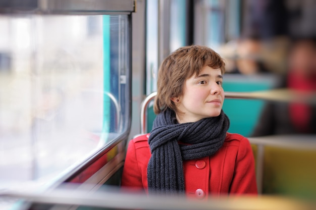 Portrait of young beautiful girl in Parisian metro