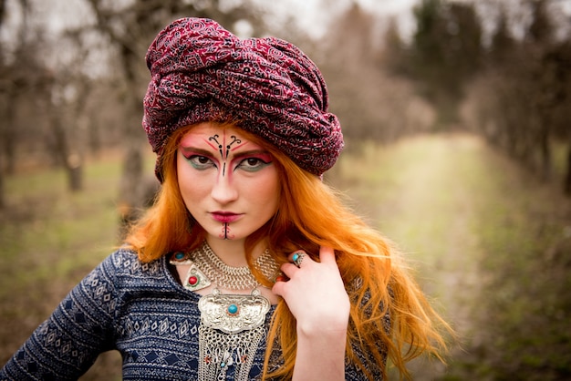 Portrait of a young beautiful girl wearing a turban