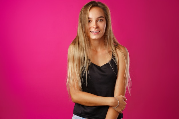 Portrait of a young beautiful happy woman smiling