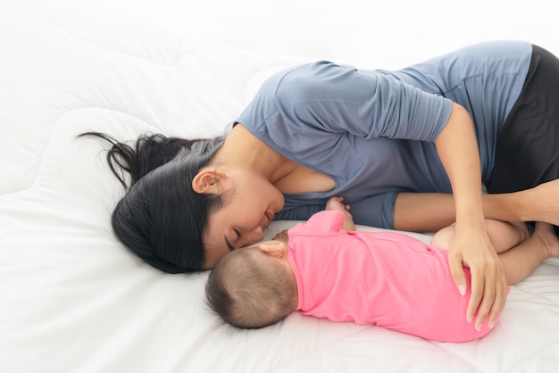 Portrait of young beautiful mother with her child