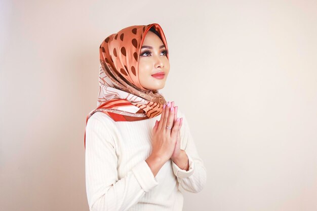 Portrait young beautiful Muslim woman wearing a hijab Eid Mubarak greeting