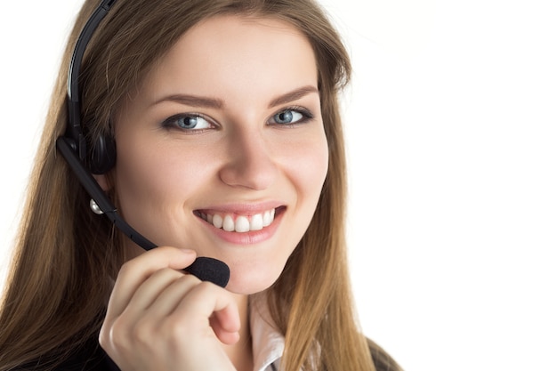 Photo portrait of young beautiful smiling call center worker talking to someone. smiling customer support operator at work