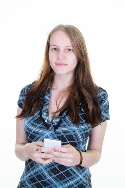 Portrait of young beautiful woman hand phone looks in camera