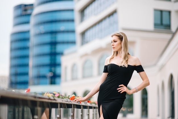 Portrait of a young beautiful woman outdoors