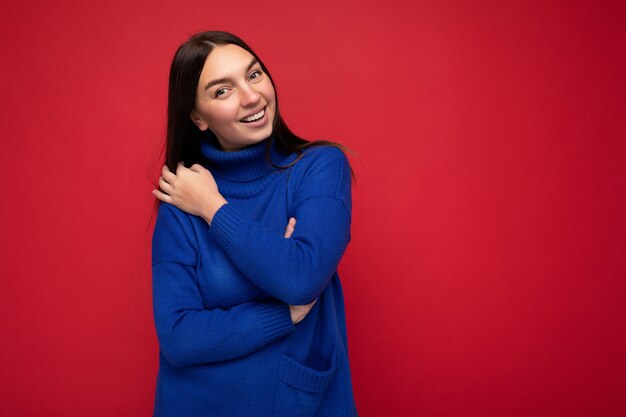 Portrait of young beautiful woman in stylish clothes