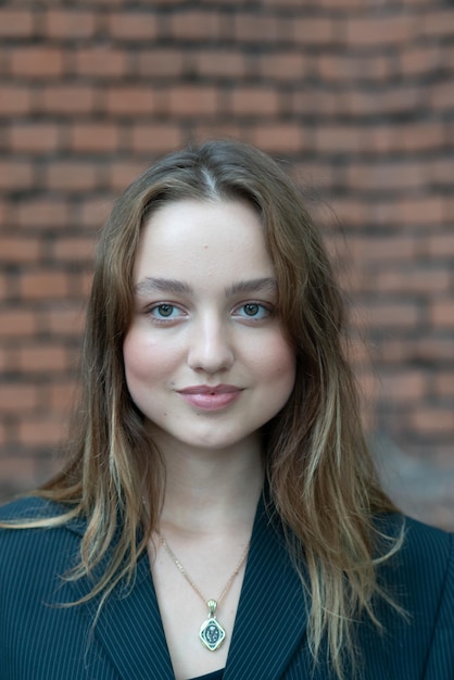 portrait of young beautiful woman in summer outside