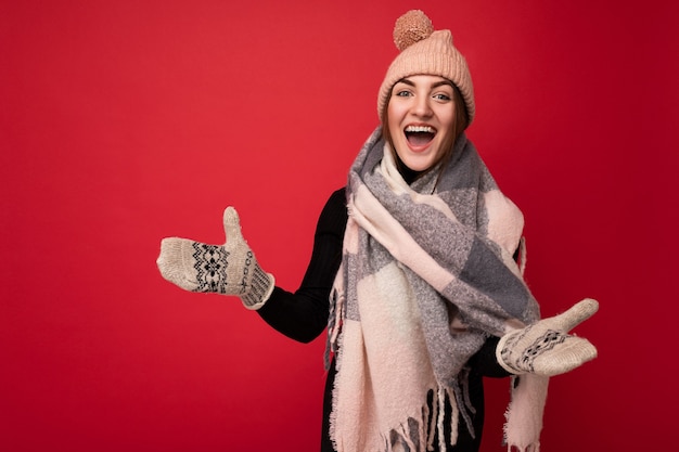 Portrait of young beautiful woman in winter clothes