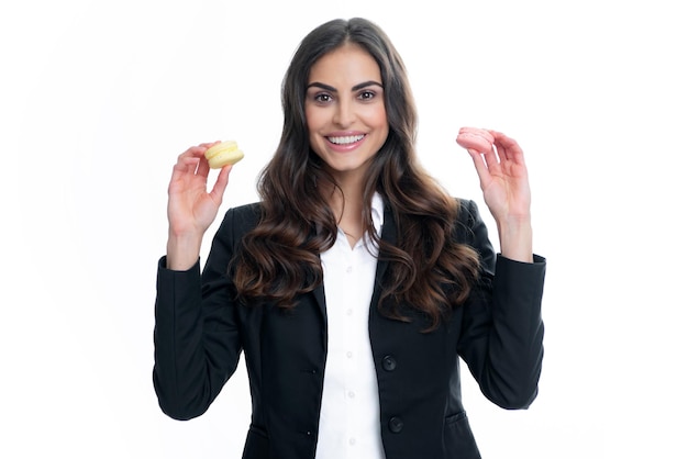 Portrait of young beautiful woman with macaroons French macaron Girl enjoying sweets isolated on white background