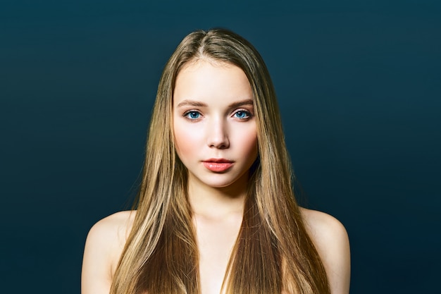 Portrait of young blond looking up girl, close up shot