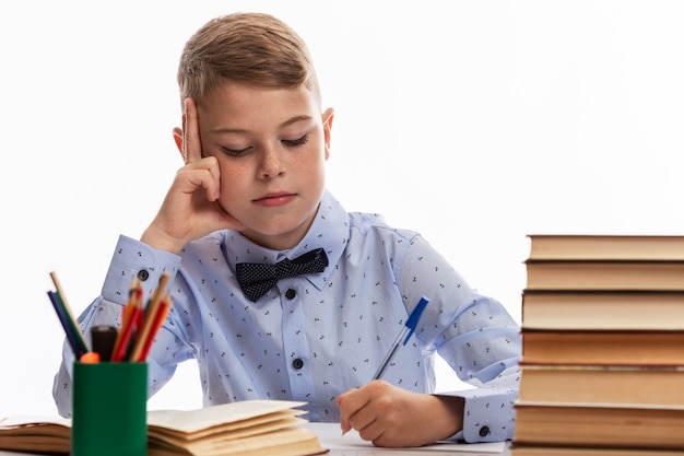 Portrait young boy studying