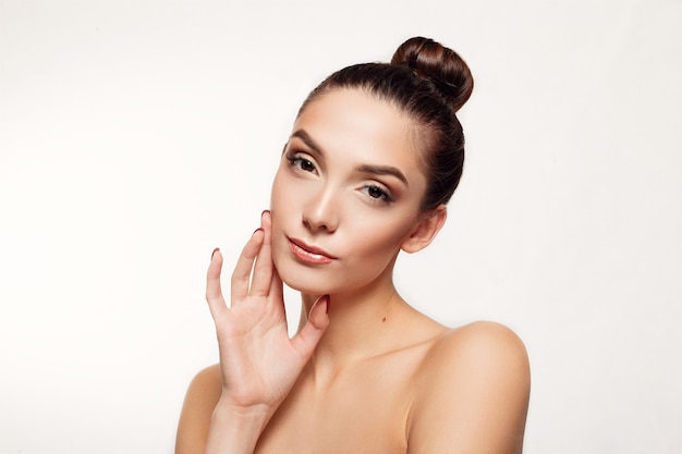 Portrait of young brunette woman posing